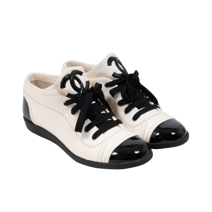 Low Top Leather Sneakers (Cream/Black) CHANEL 