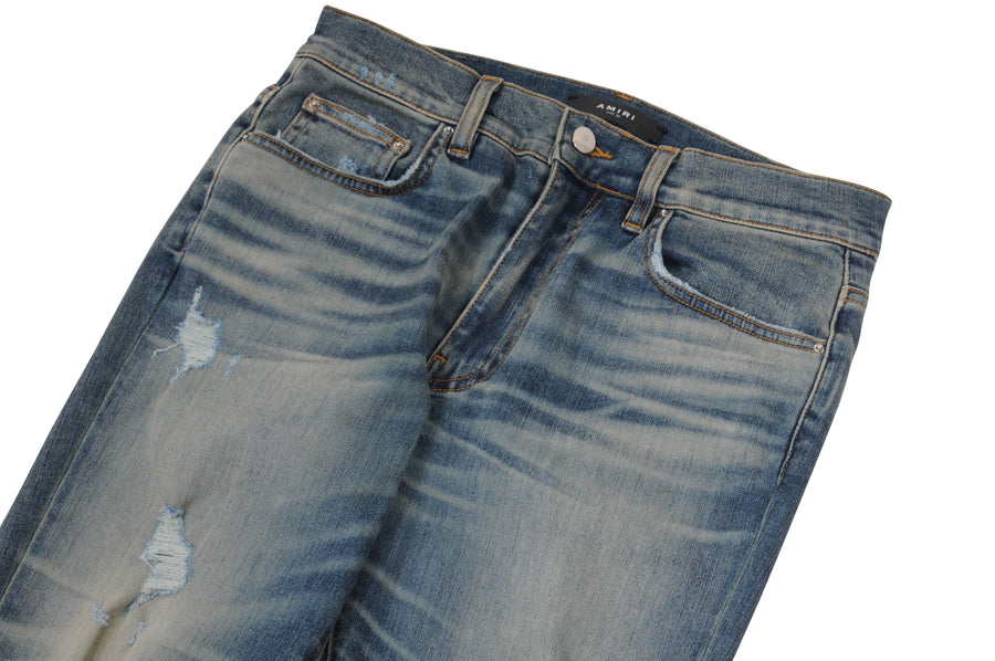 Medium Blue Light Wash Distressed Knee Blowout Thrasher Denim Skinny Jeans Amiri 