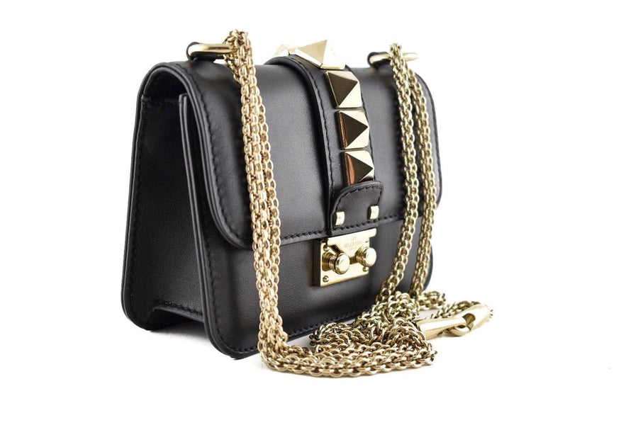 Rockstud leather mini bag Valentino Garavani Gold in Leather - 34570302